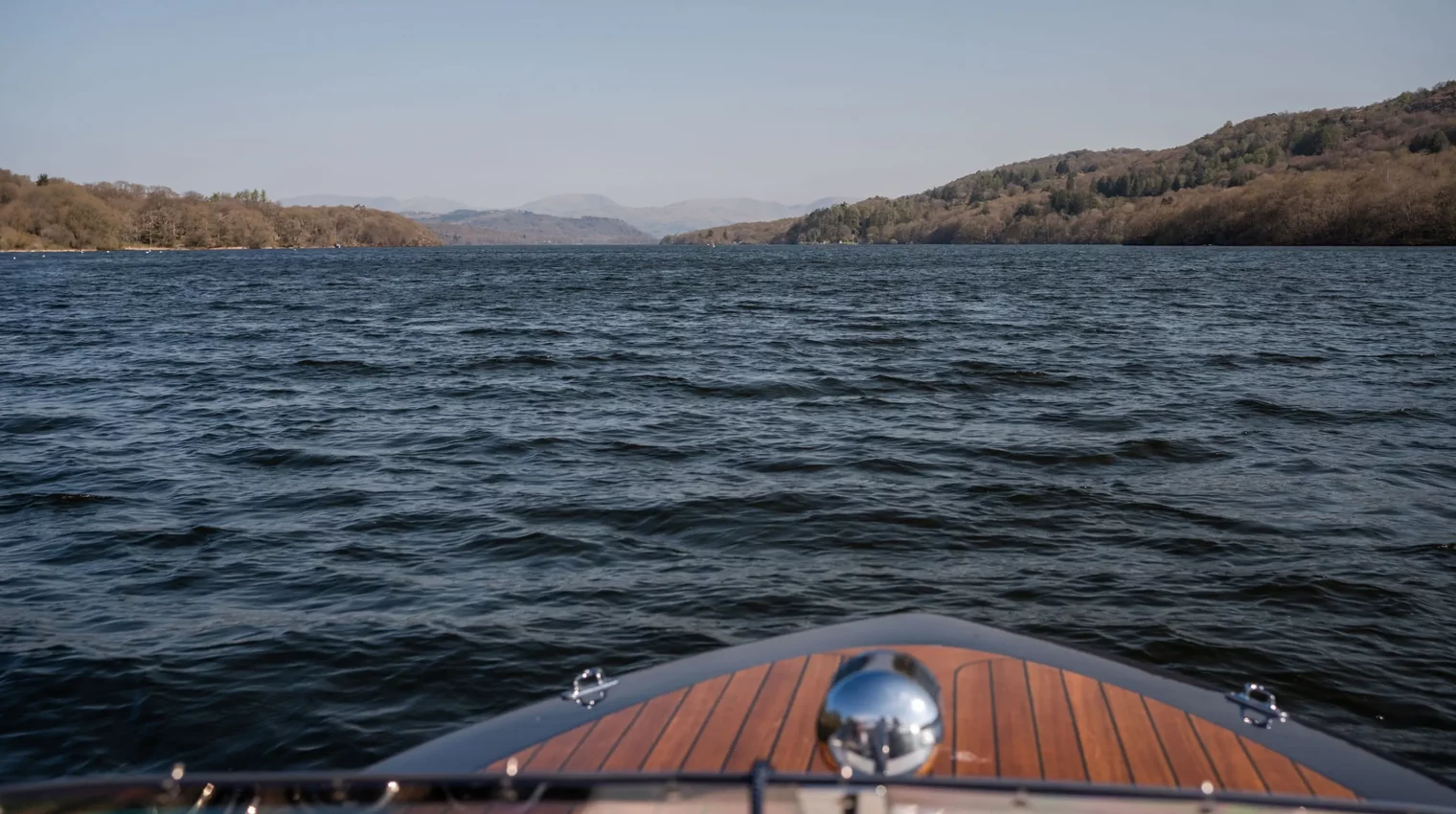 A view North up Lake Windermere from the front of a boat