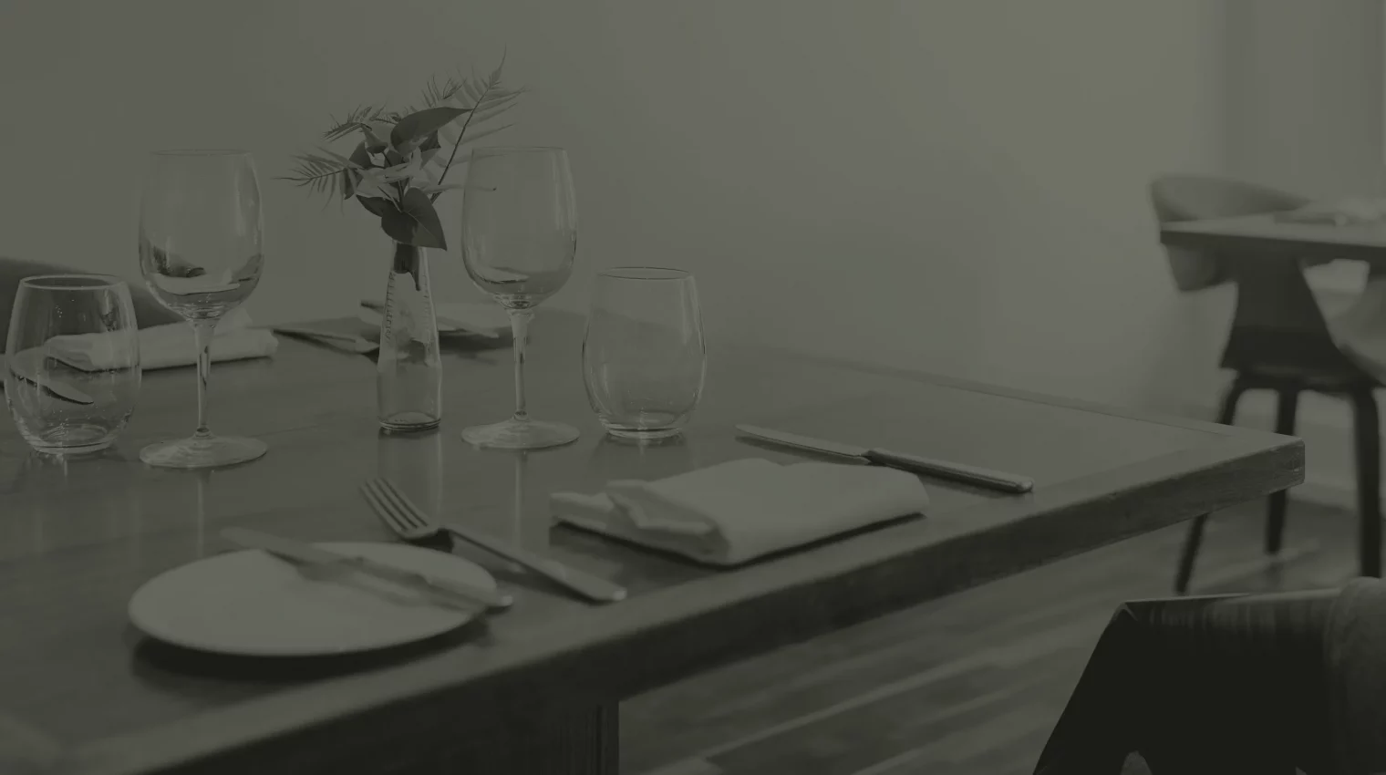 Green duotone background image of restaurant table