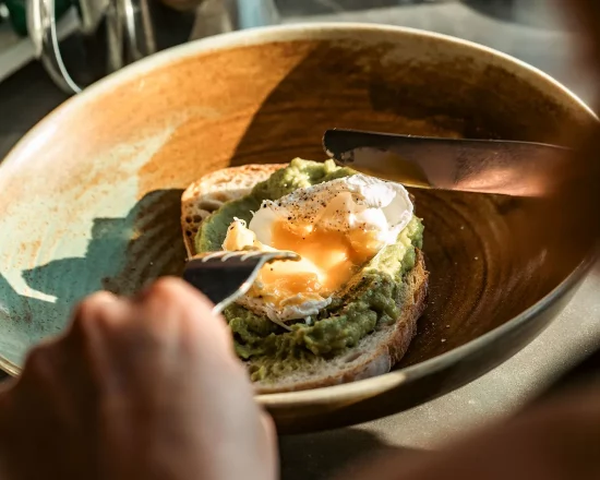 Poached egg and avocado on toast