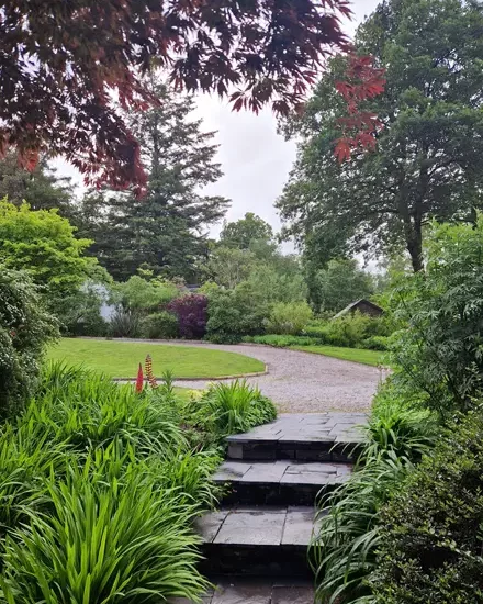 A pathway through the beautiful gardens at the Lakeside