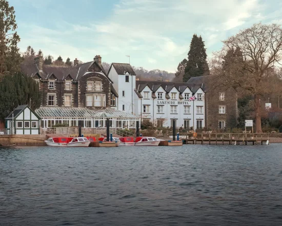 View of Lakeside Hotel building and gardens from Lake Windermere