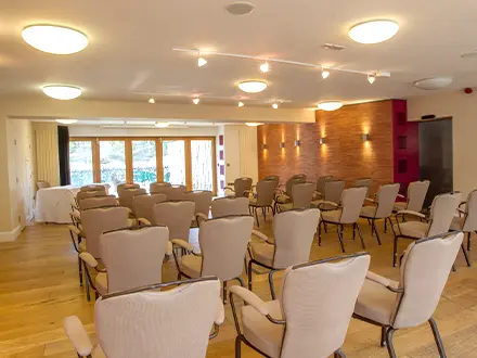 Large meeting room conference suite arranged for a conference presentation