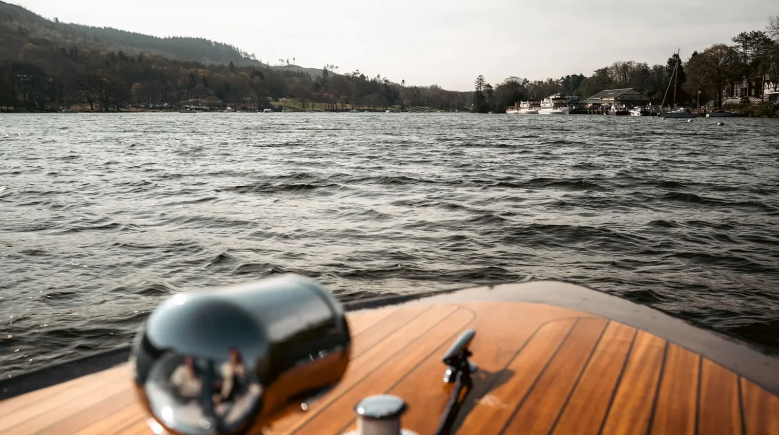 View from the front of a private hire boat across Lake Windermere